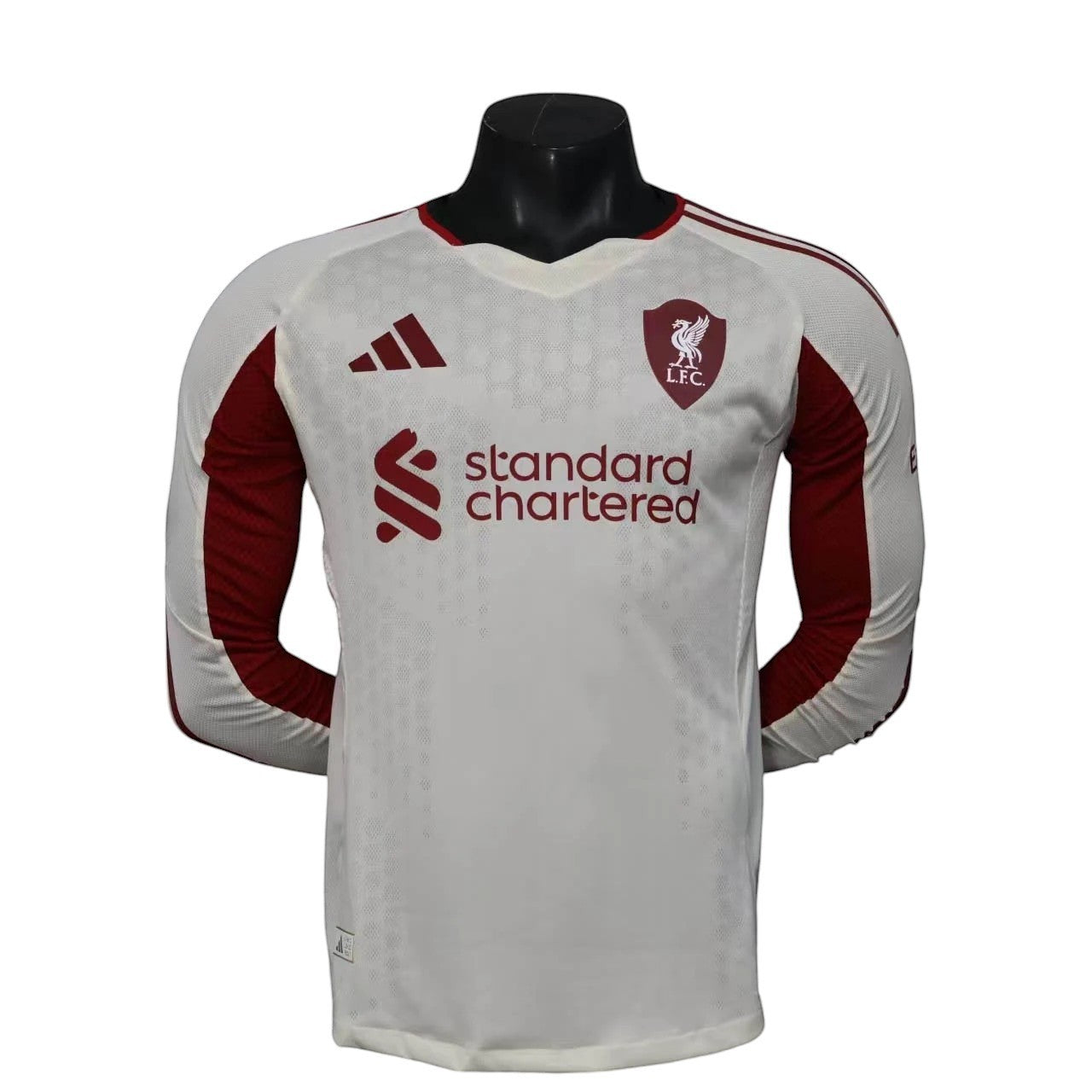 GOATkitz Liverpool 2025-26 white long sleeve player version away jersey with maroon accents and sponsor logo.