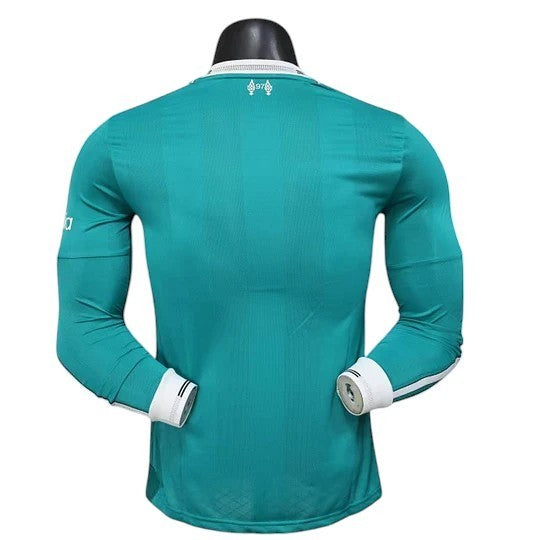 GOATkitz Liverpool 2025-26 teal long sleeve player version jersey with white cuffs and subtle striped pattern.
