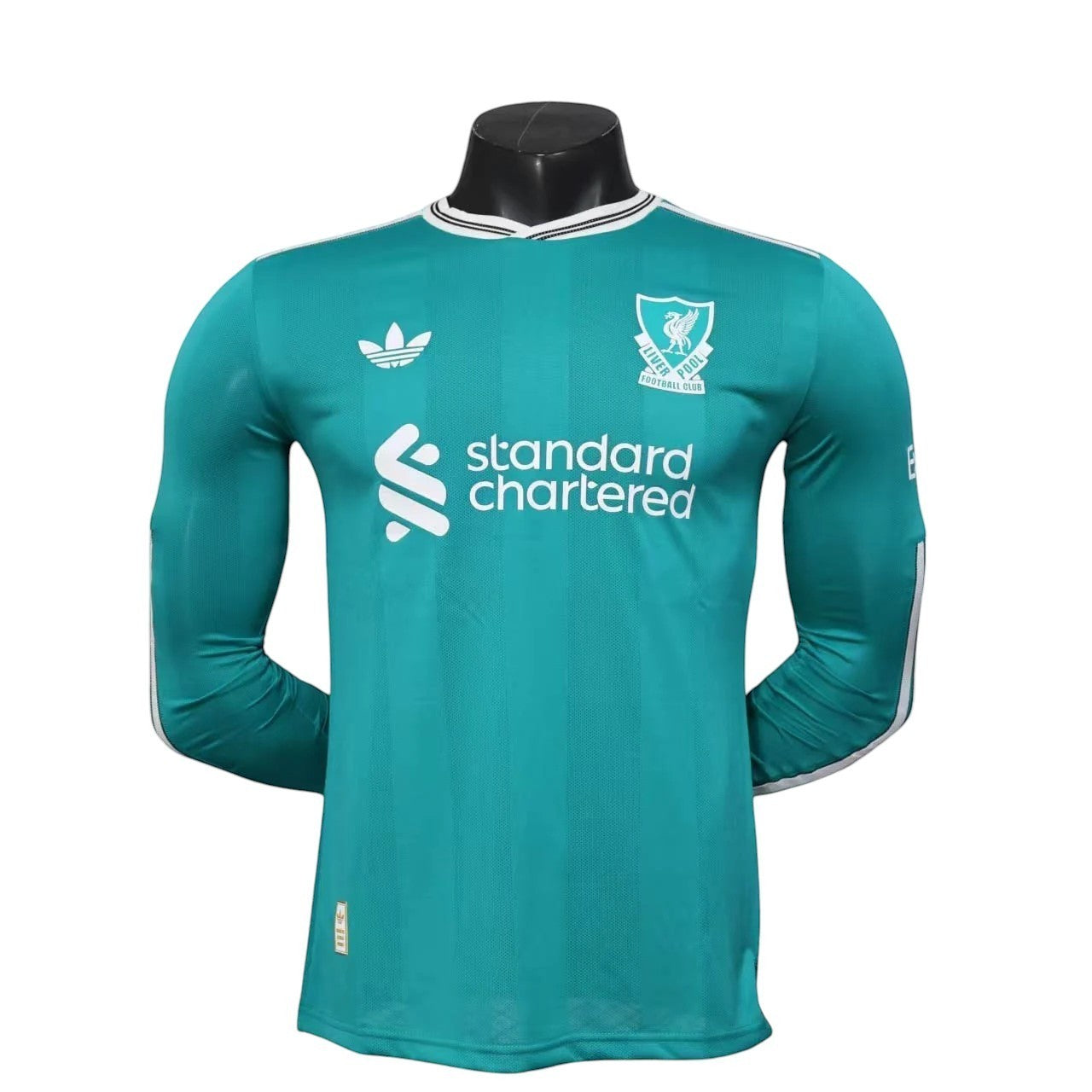 GOATkitz Liverpool 2025-26 adult player version third long sleeve jersey in teal with white accents and crest.