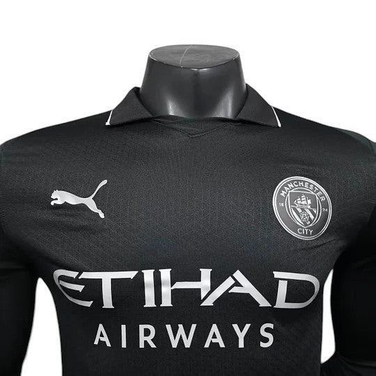 GOATkitz Manchester City 2025-26 black player version away jersey with white Puma logo and crest. Customizable.