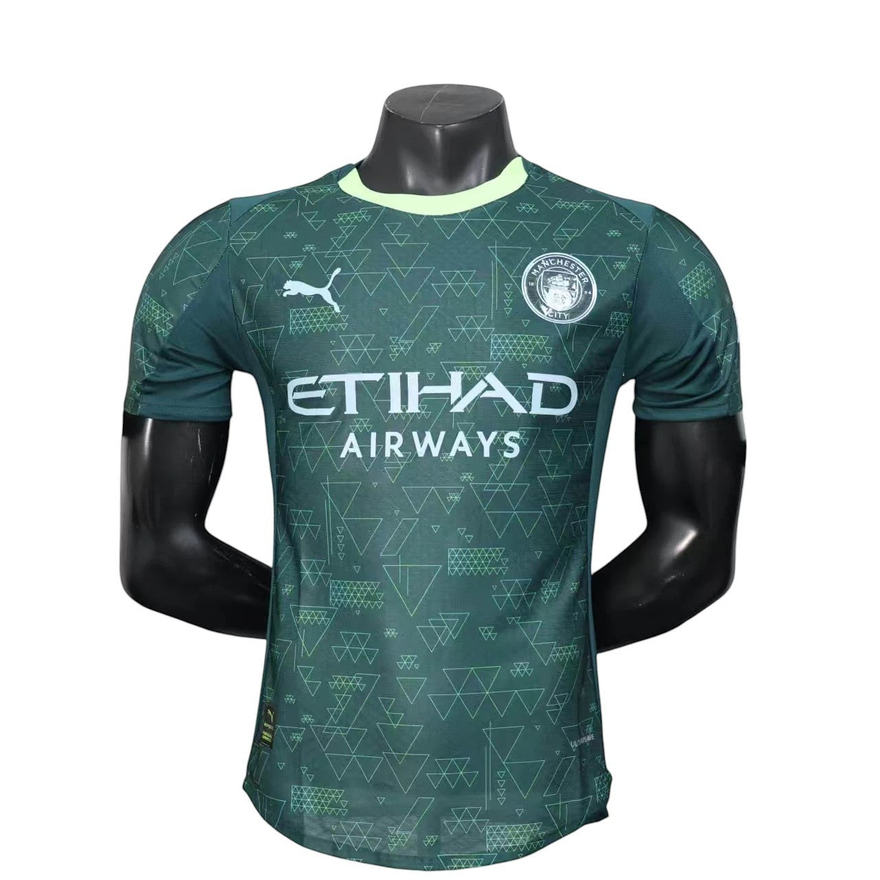 GOATkitz Manchester City 2025-26 adult player version fourth jersey in dark green with geometric pattern and light green collar. Customizable.
