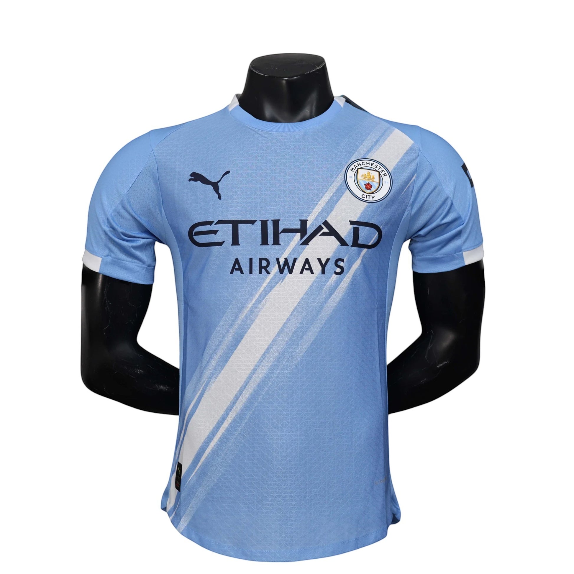 GOATkitz Manchester City 2025-26 light blue player version football jersey with white accents and Etihad Airways sponsor.