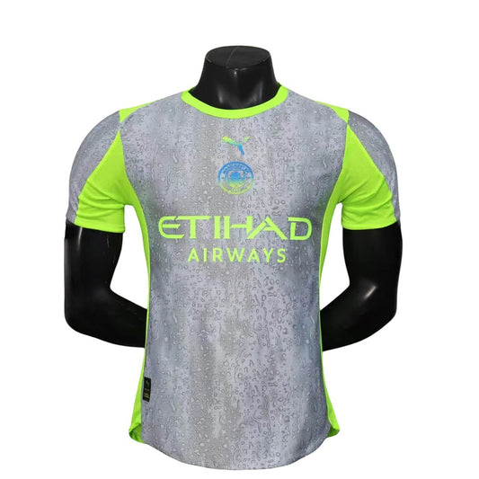 GOATkitz Manchester City 2025-26 player version third jersey in grey with lime green accents and a water droplet pattern.
