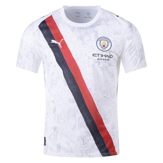 GOATkitz Manchester City x KidSuper 2025-26 kids' white jersey with red and black diagonal stripe detail, featuring club crest and Etihad Airways sponsor.
