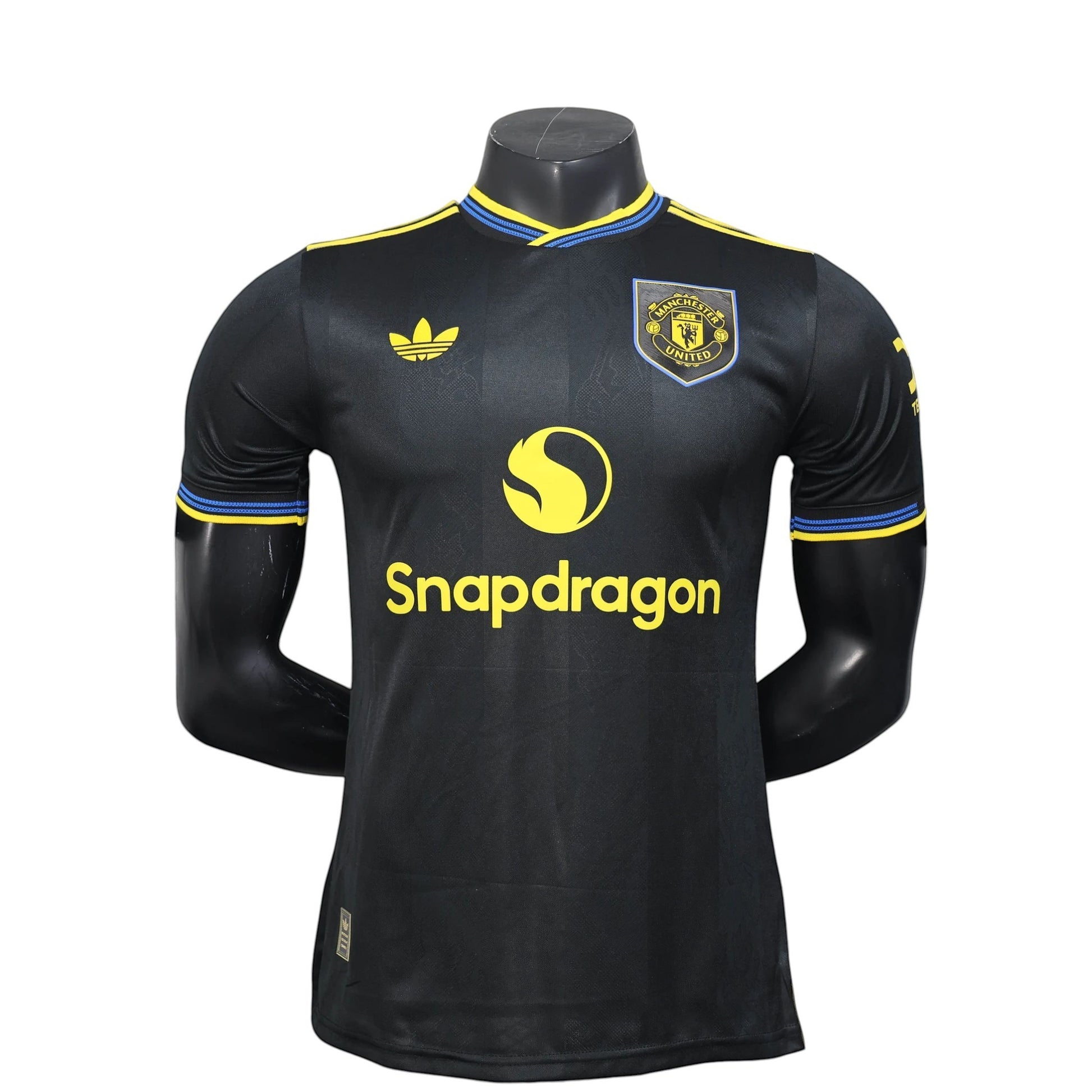 GOATkitz Manchester United 2025-26 black player version third jersey with yellow and blue trim. Customizable.