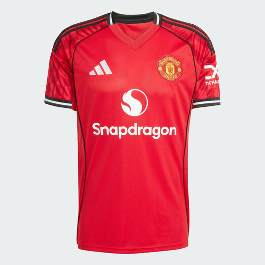GOATkitz Manchester United 2025-26 adult home jersey in red with white Snapdragon logo and Adidas stripes.