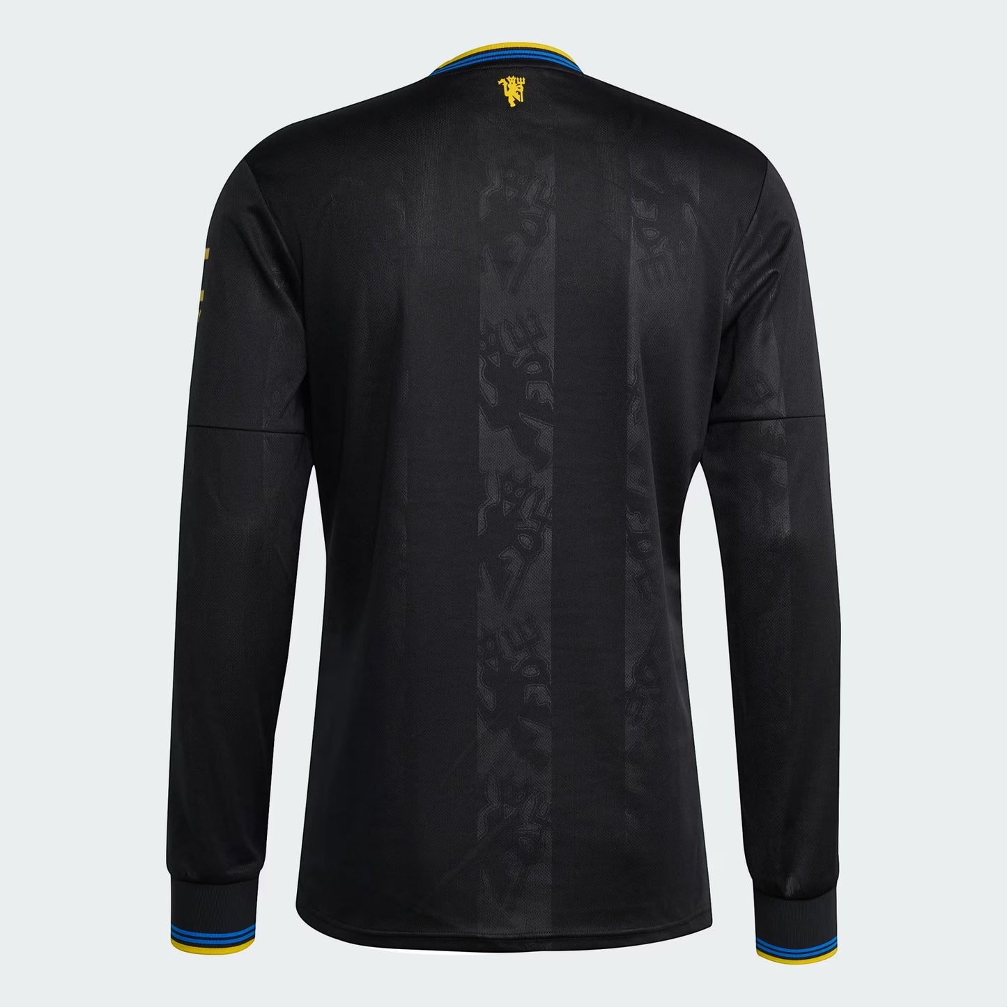 GOATkitz Manchester United 2025-26 black long sleeve football jersey with blue and yellow trim on collar and cuffs.