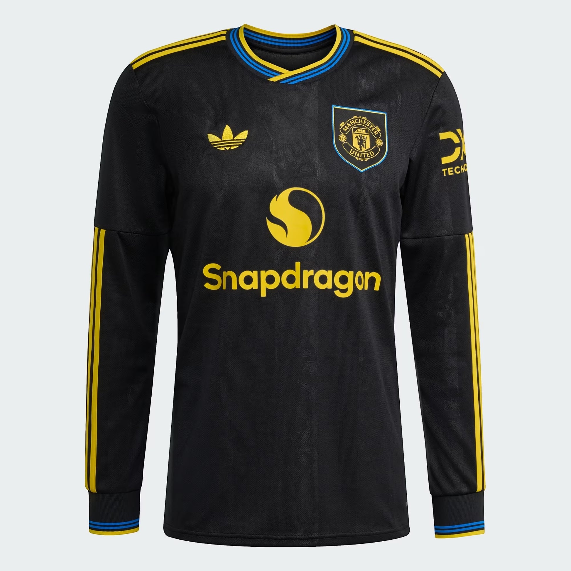 GOATkitz Manchester United 2025-26 black long sleeve football jersey with yellow and blue accents. Features Snapdragon logo.