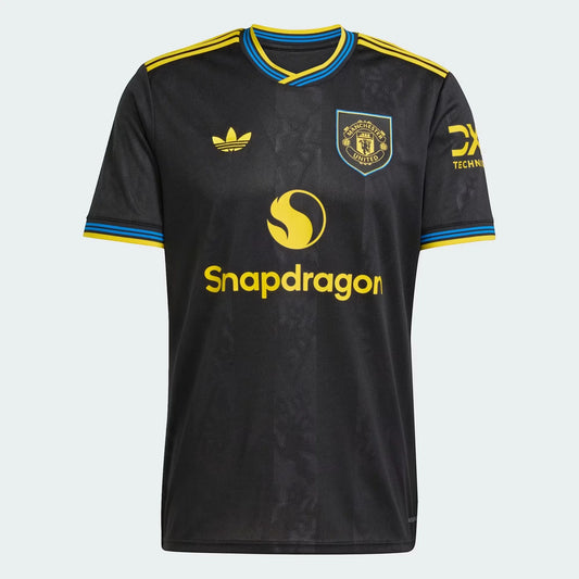 GOATkitz Manchester United 2025-26 kids black football jersey with yellow and blue trim. Features Snapdragon logo.