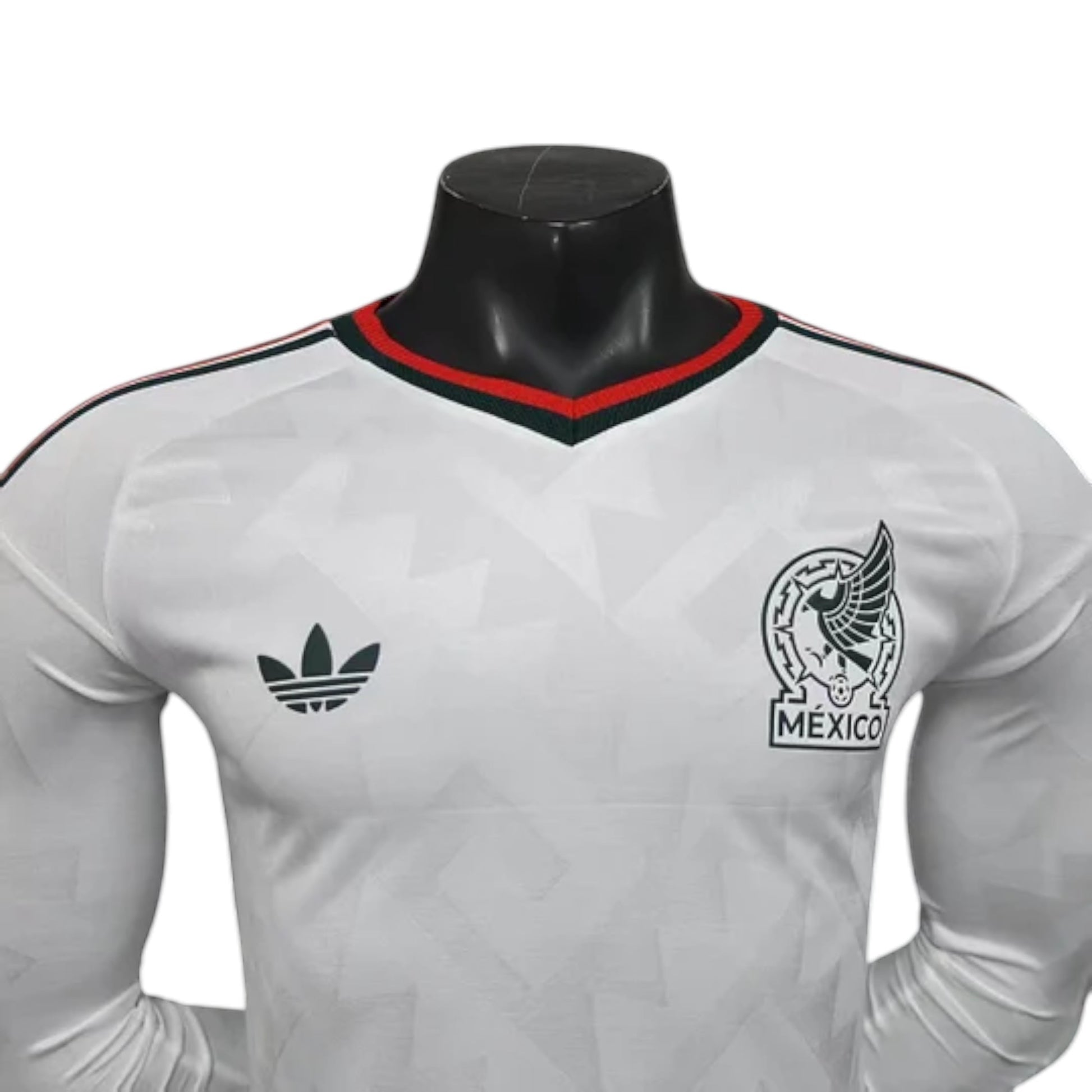 GOATkitz white long sleeve Mexico 2026 player version away jersey with green and red trim on the collar and sleeve stripes.