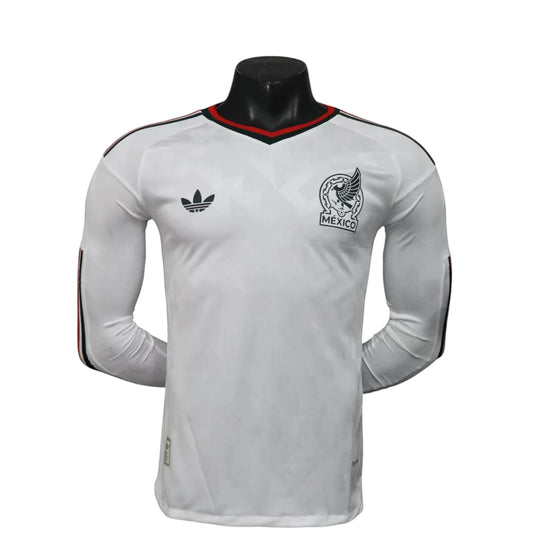GOATkitz Mexico 2026 long sleeve player version away jersey in white with red and green trim on the collar and sleeves. Features the Mexico crest and Adidas logo.
