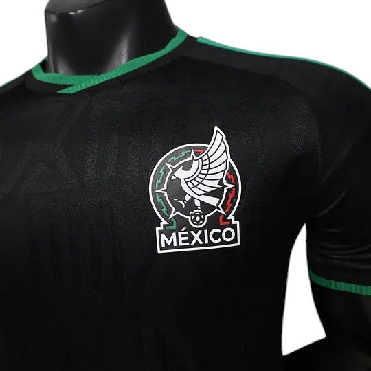 GOATkitz Mexico 2026 black long sleeve player version soccer jersey with green trim and Mexico crest.