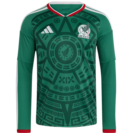 GOATkitz Mexico 2026 long sleeve adult home jersey in green with white and red trim. Features Aztec-inspired graphic pattern.
