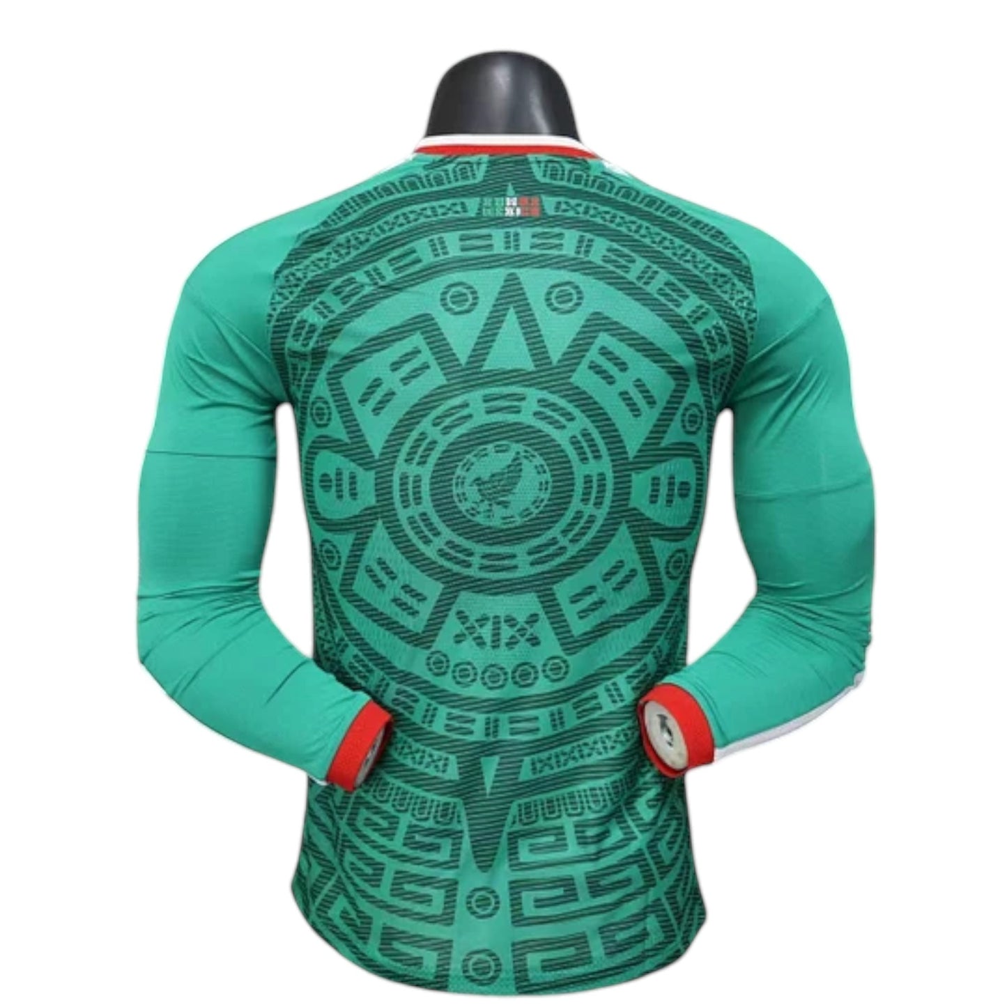 GOATkitz Mexico 2026 long sleeve player version home jersey in green with Aztec-inspired print and red cuffs.