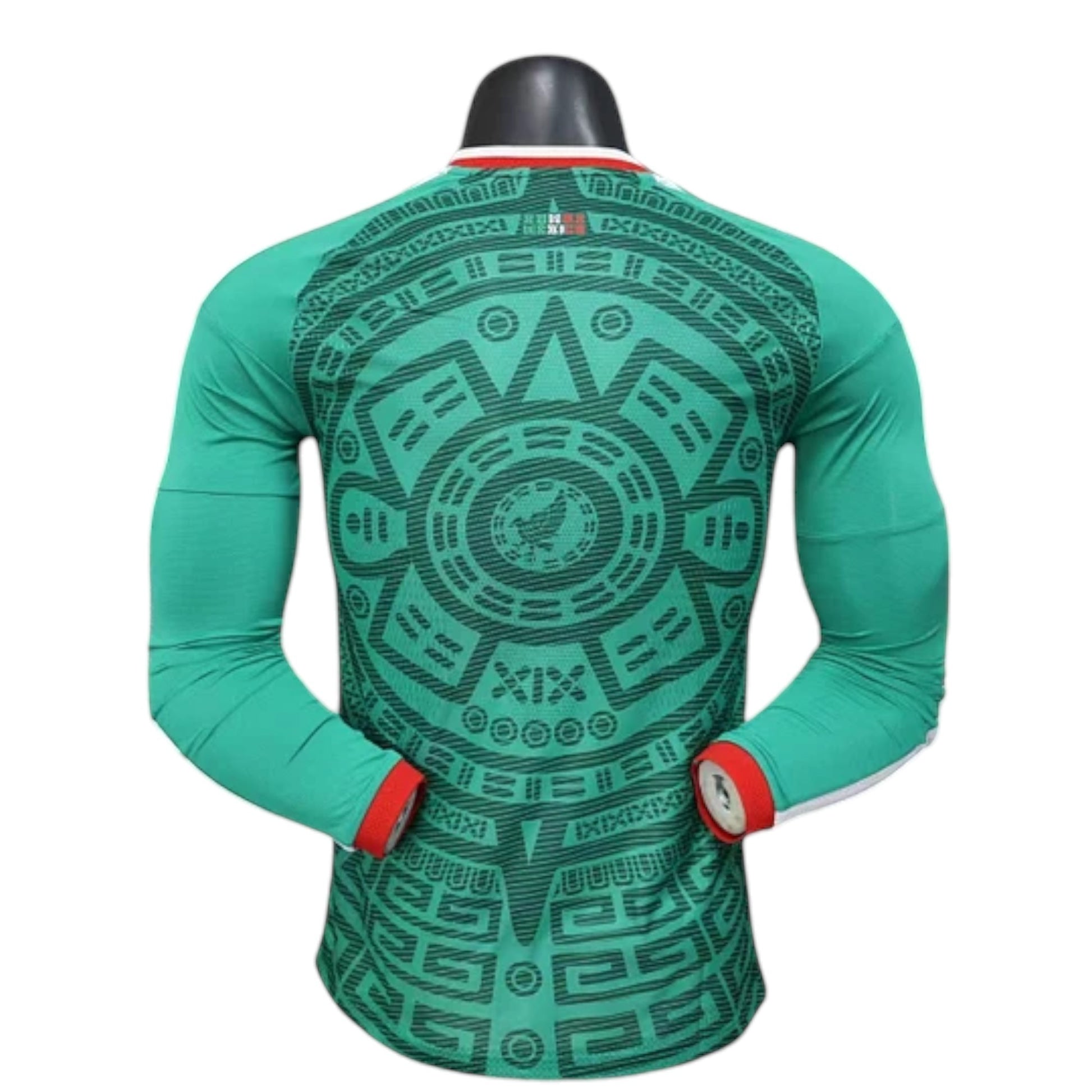 GOATkitz Mexico 2026 long sleeve player version home jersey in green with Aztec-inspired print and red cuffs.
