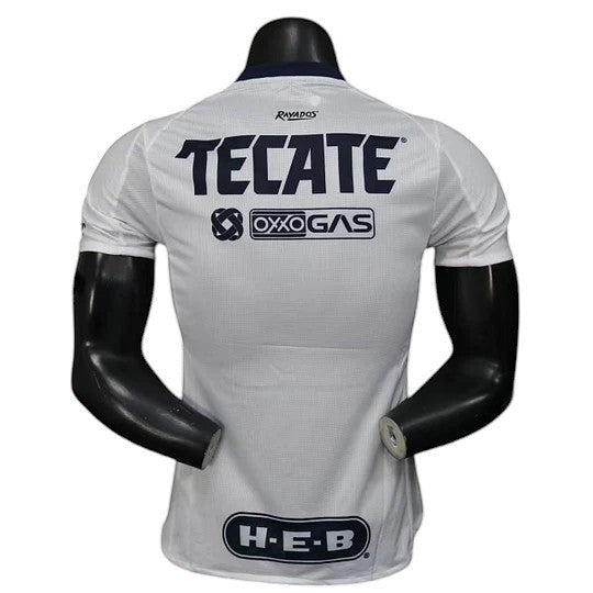 GOATkitz white 2025-26 Monterrey player version away jersey with navy blue accents and sponsor logos.