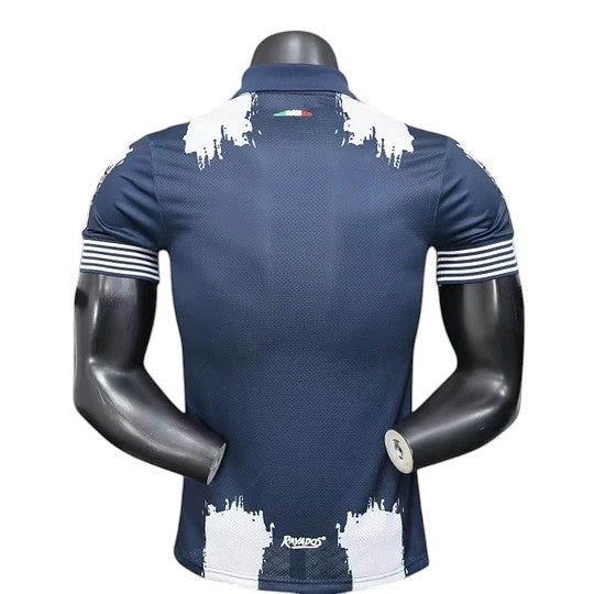 GOATkitz Monterrey 2025 Club World Cup player version home jersey, dark blue with white distressed graphic accents and striped sleeves.
