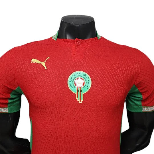 GOATkitz Morocco 2026 player version home jersey in red with green accents and crest. Customizable.