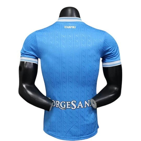 GOATkitz Napoli 2025-26 player version light blue football jersey with white trim and subtle vertical pattern. Customizable.