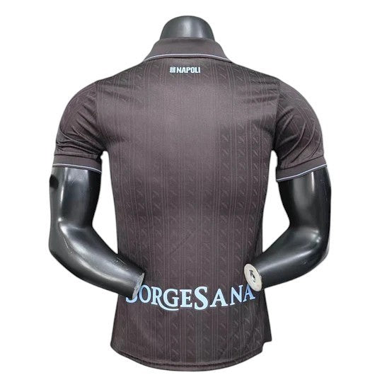 GOATkitz Napoli 2025-26 adult player version third jersey in dark brown with light blue trim and subtle vertical pattern. Customizable.