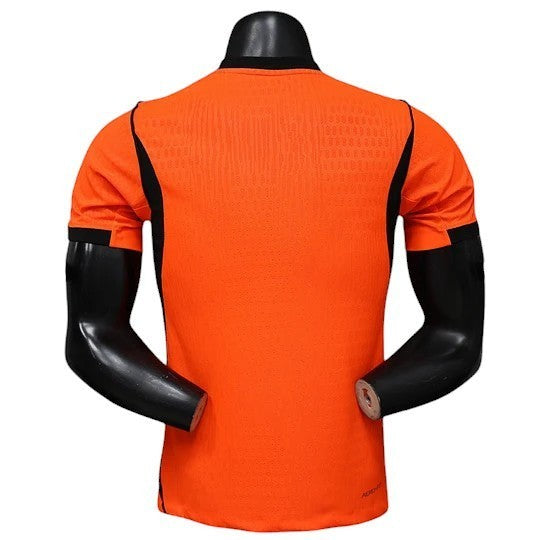 GOATkitz Netherlands 2026 player version home jersey, bright orange with black accents on sleeves and sides. Lightweight, breathable fabric.