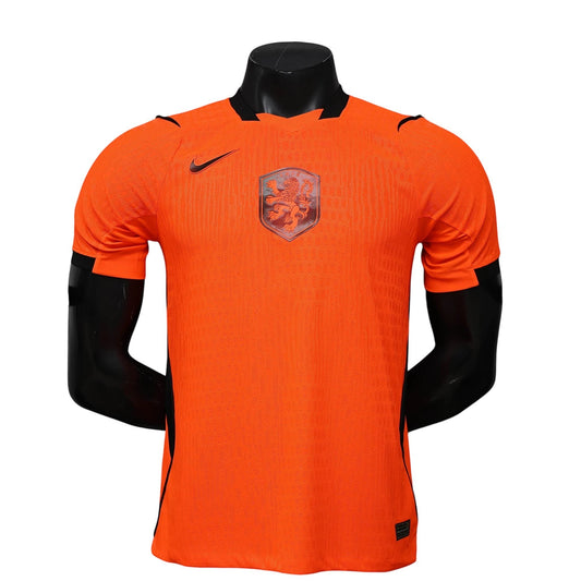 GOATkitz Netherlands 2026 player version home jersey in orange with black accents and crest. Customizable.