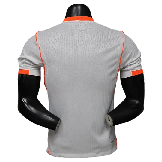 GOATkitz Netherlands 2026 player version away jersey, white with orange trim and subtle textured pattern.