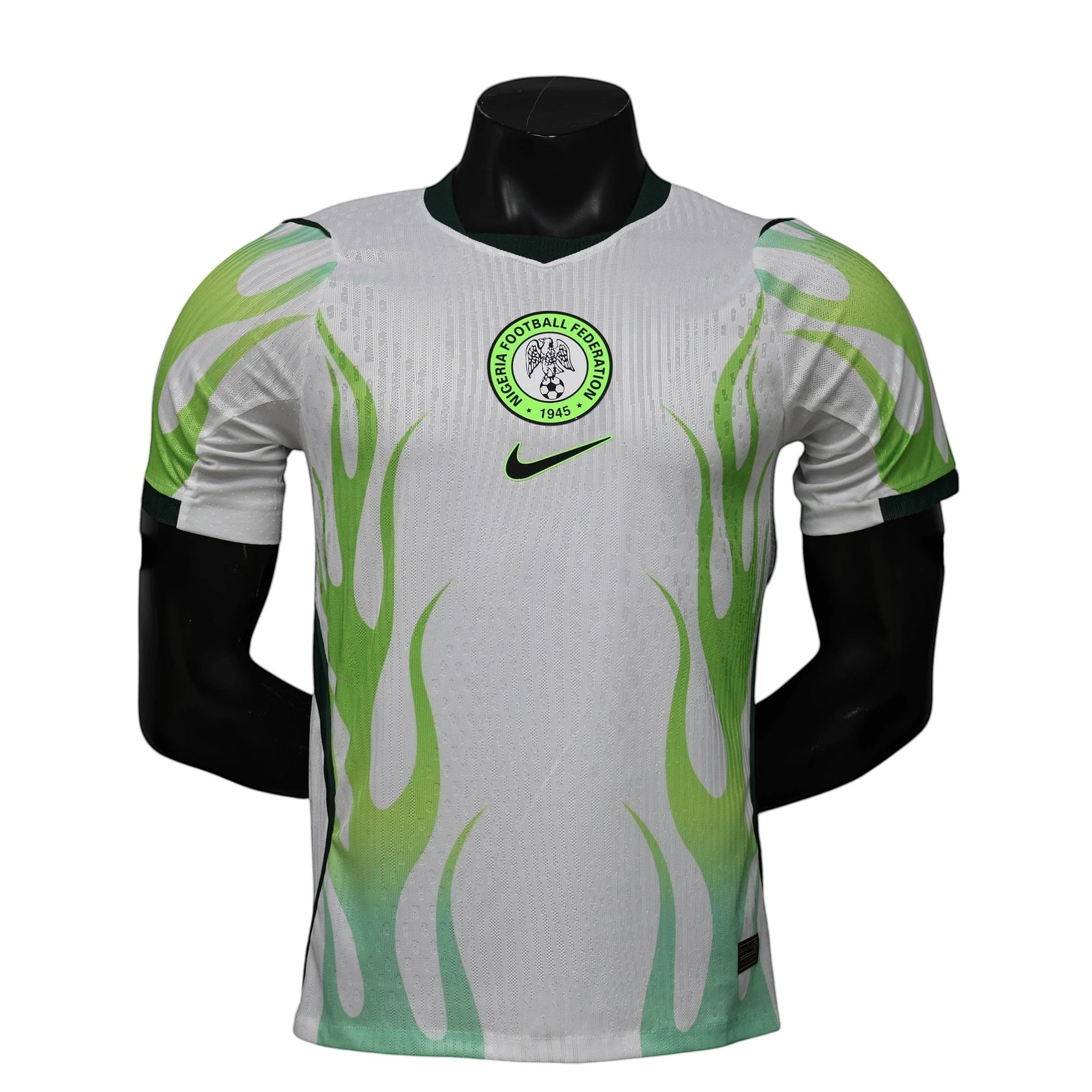GOATkitz Nigeria 2026 player version away jersey in white with green flame design and dark green trim. Features Nigeria Football Federation crest.