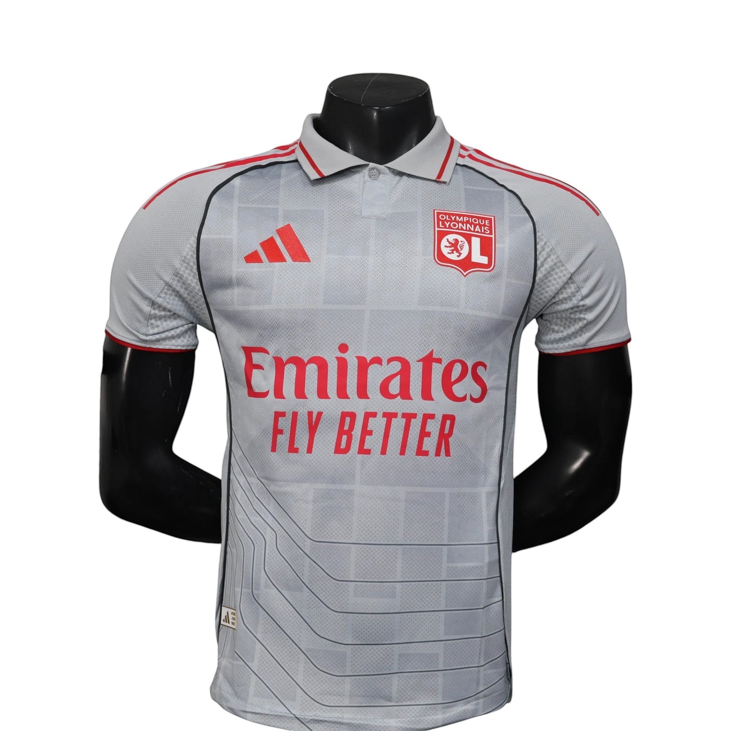 GOATkitz Olympique Lyonnais 2025-26 player version third jersey in grey with red accents. Features Emirates Fly Better sponsor.