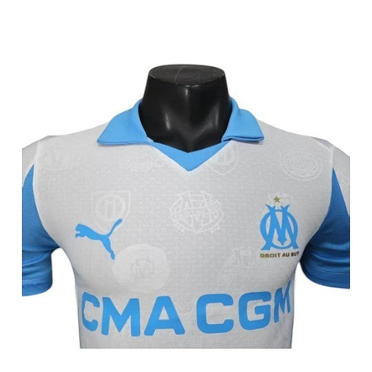 GOATkitz Olympique de Marseille 2025-26 Player Version Home Jersey, white with light blue accents, featuring Puma logo and club crest.