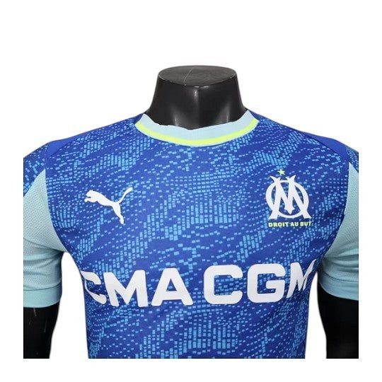 GOATkits Olympique de Marseille 2025-26 player version third jersey in blue with CMA CGM logo and light blue accents.