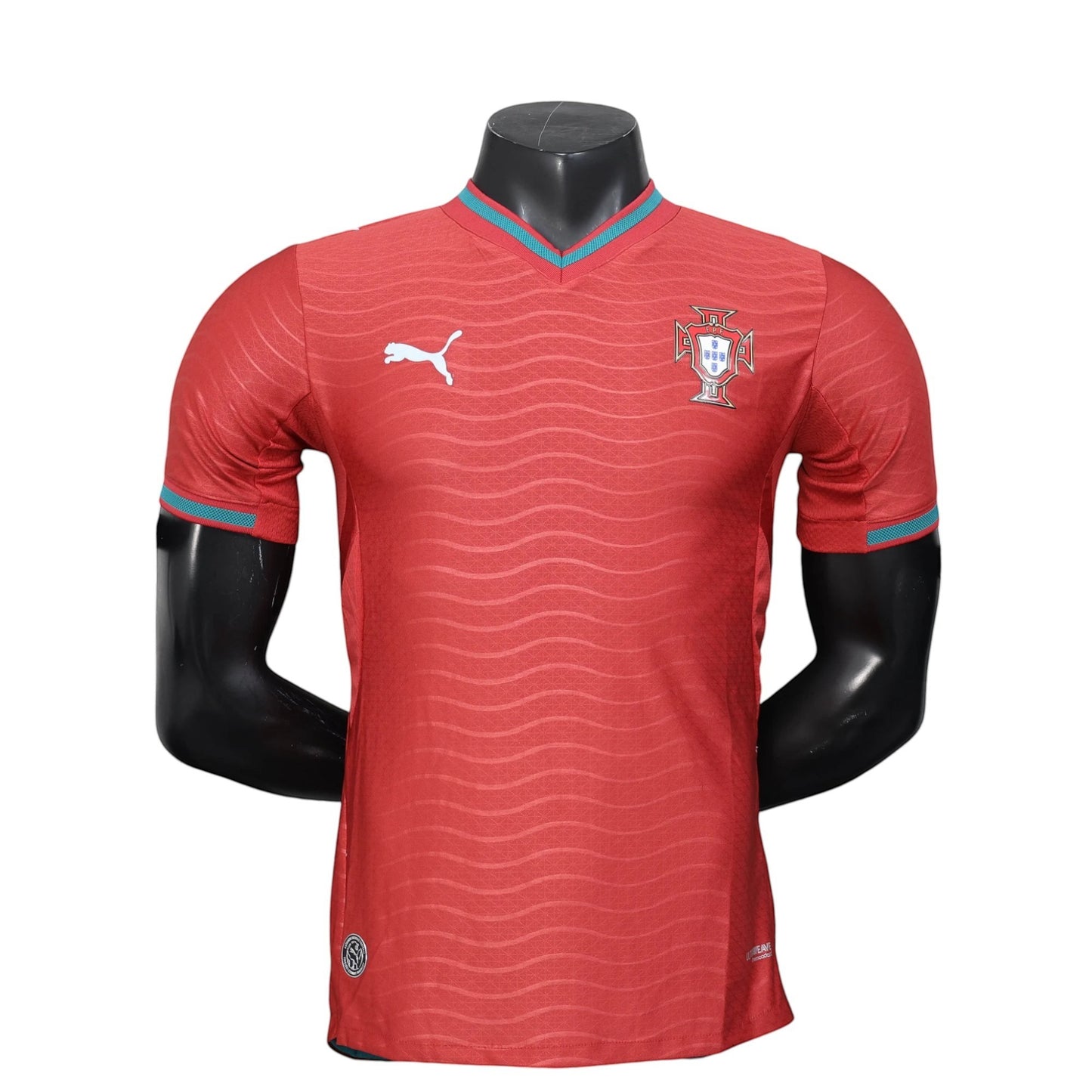 GOATkitz Portugal 2026 player version red jersey with teal trim and wavy pattern. Customizable.