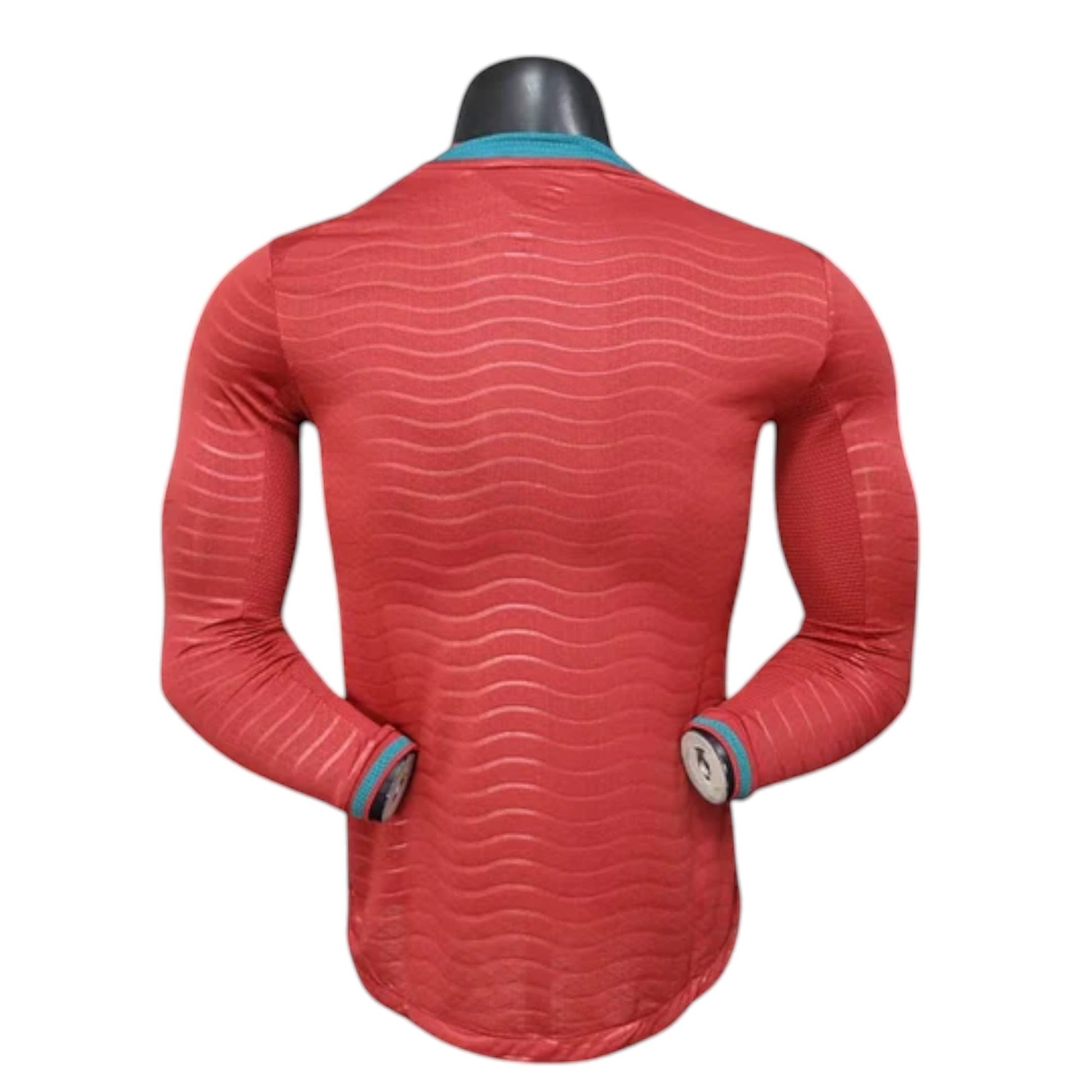 GOATkitz Portugal 2026 red long sleeve player version jersey with wave pattern and teal trim.