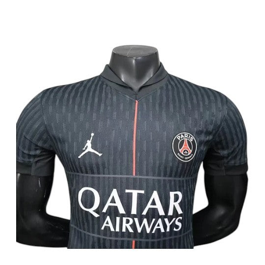 GOATkitz Paris Saint-Germain 2025-26 Jordan 4th jersey, black with subtle vertical stripe pattern, white Jumpman logo, and red trim.