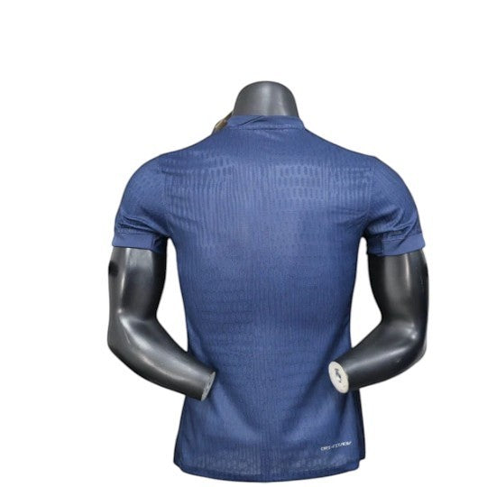 GOATkitz navy blue PSG 2025-26 player version soccer jersey with subtle geometric pattern.