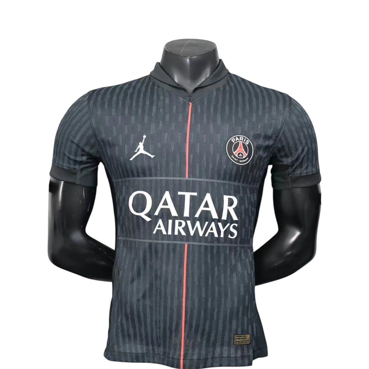 GOATkitz PSG 2025-26 Player Version Jordan 4th Jersey, dark grey with vertical pinstripes and red accents. Features Qatar Airways sponsor.