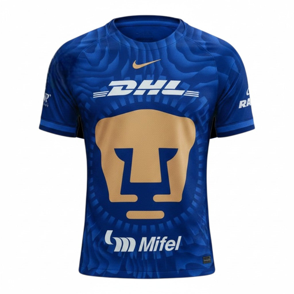 GOATkitz Pumas UNAM 2025-26 adult away jersey in royal blue with gold Pumas logo and DHL sponsor.