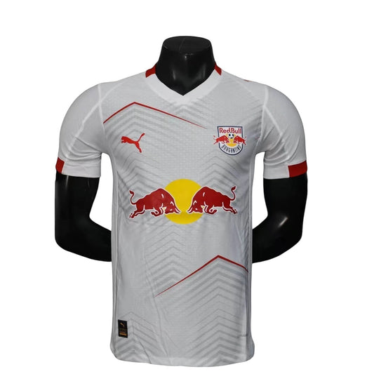GOATkitz RB Leipzig 2025-26 adult player version home jersey in white with red accents and bull graphics. Customizable.