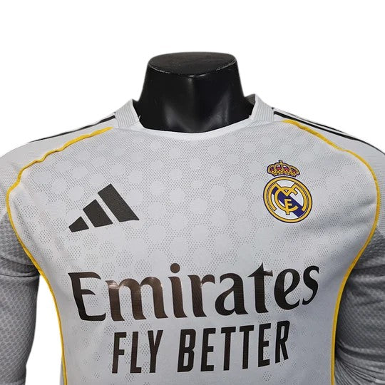 GOATkitz Real Madrid 2025-26 white long sleeve player version jersey with yellow trim and Emirates Fly Better sponsor.