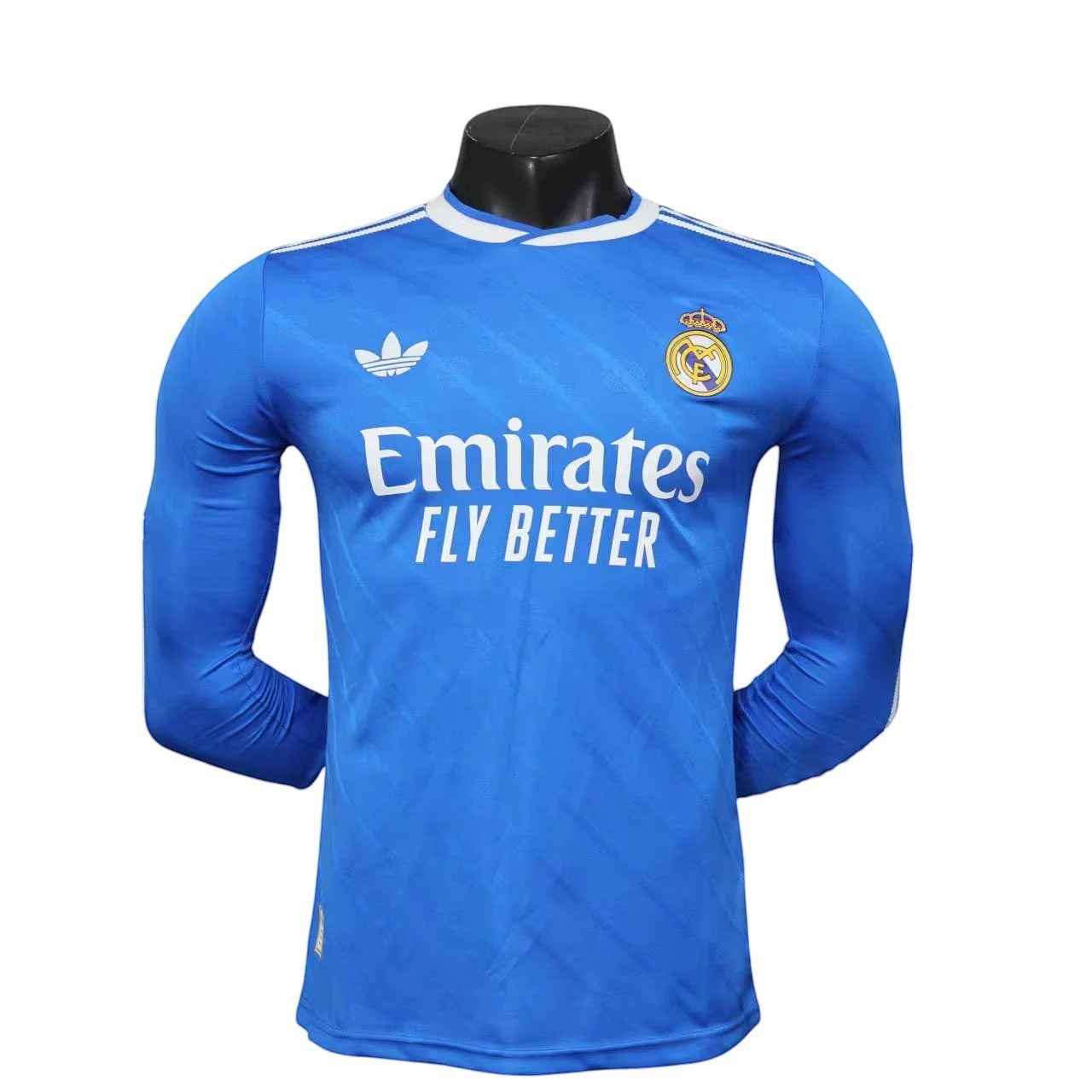 GOATkitz Real Madrid 2025-26 adult player version third long sleeve jersey in blue with Emirates Fly Better sponsor.