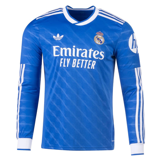 GOATkitz Real Madrid 2025-26 blue long sleeve fan jersey with white Emirates Fly Better logo and Adidas stripes.