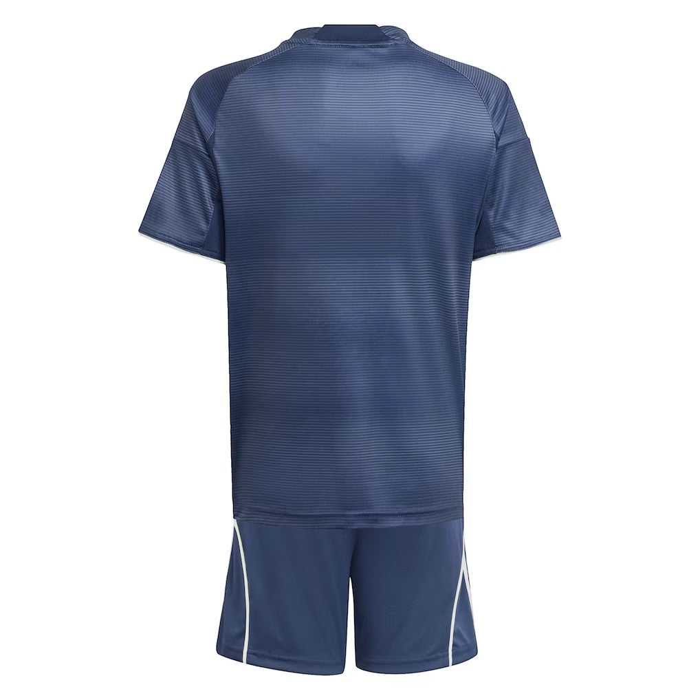 GOATkitz Real Madrid 2025-26 kids away jersey and shorts set in navy blue with subtle horizontal stripe pattern.