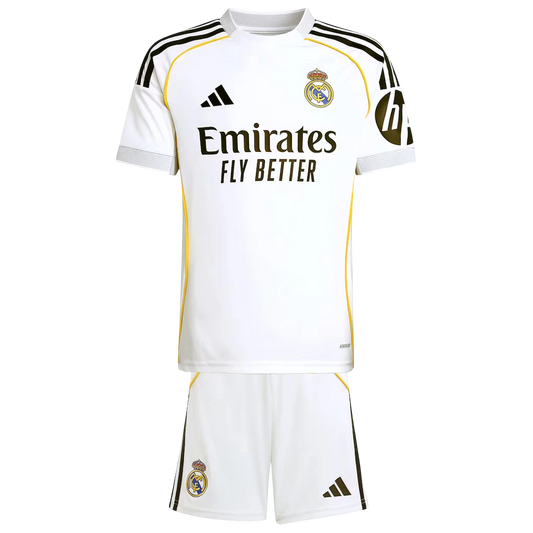 GOATkitz Real Madrid 2025-26 kids white football jersey and shorts set with yellow trim and black stripes.