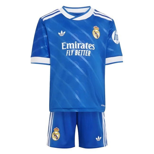 GOATkitz Real Madrid 2025-26 kids third jersey and shorts set in royal blue with white trim and Adidas stripes.