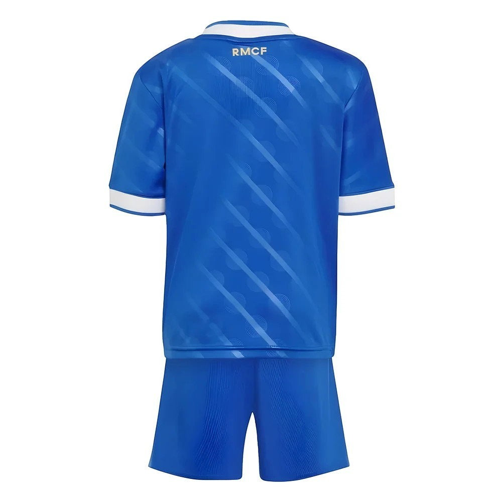 GOATkitz Real Madrid 2025-26 kids third jersey and shorts set in royal blue with white trim and subtle diagonal pattern.