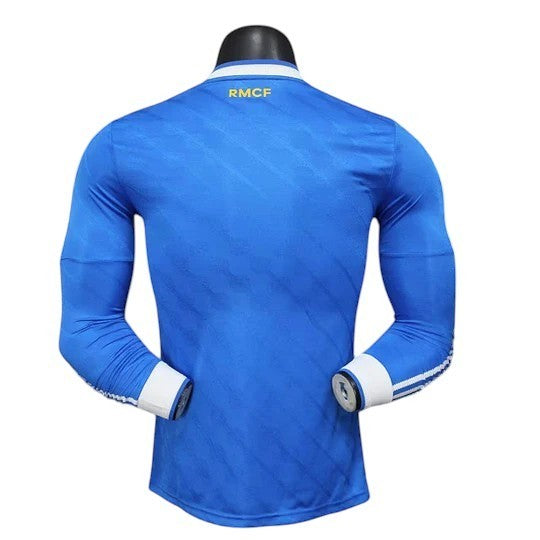 GOATkitz Real Madrid 2025-26 adult player version third long sleeve jersey in royal blue with white cuffs and collar detail.