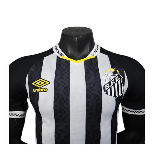 GOATkitz Santos 2025-26 player version away jersey, black and white striped, V-neck, Umbro logo.