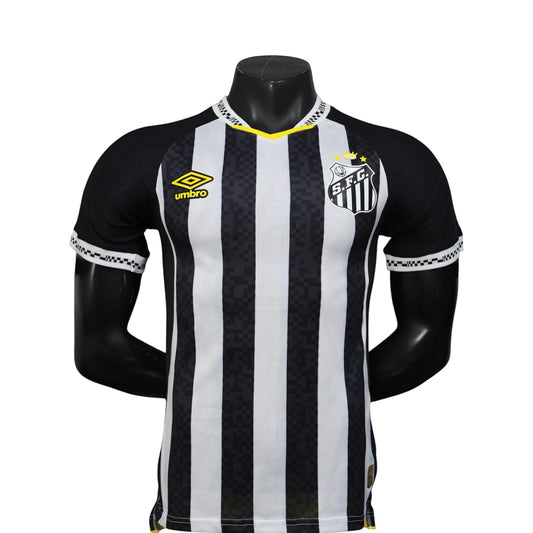 GOATkitz Santos 2025-26 player version away jersey, black and white striped, with yellow trim and Umbro logo.