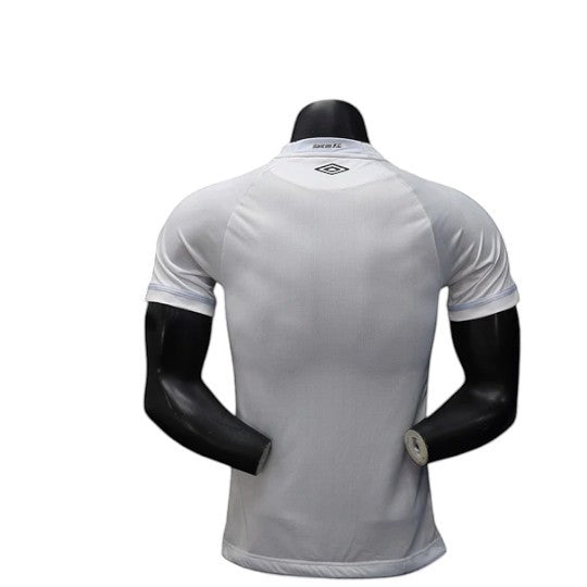 GOATkitz white Santos 2025-26 player version football jersey with light blue trim on sleeves and collar.