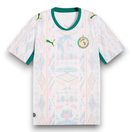GOATkitz Senegal 2026 adult home jersey, white with green trim and a colourful geometric pattern. Features Puma logo and Senegal crest.